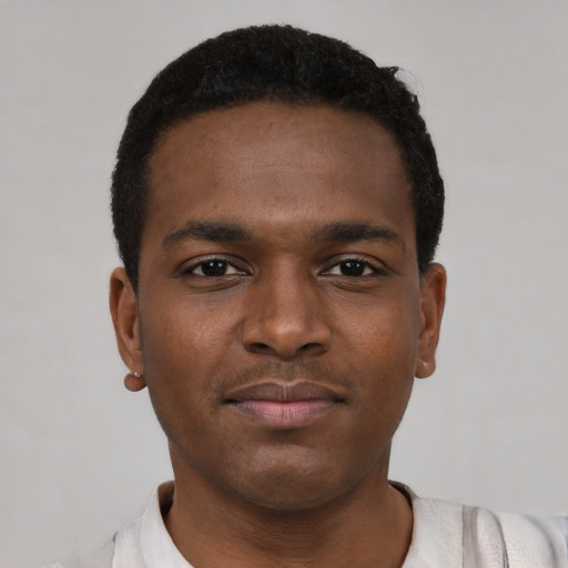 Neutral black young-adult male with short  black hair and brown eyes