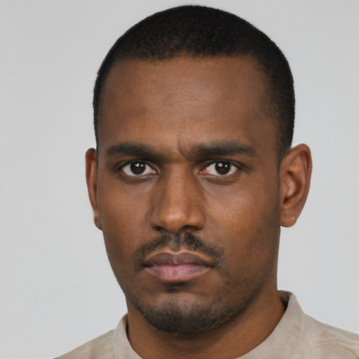 Neutral black young-adult male with short  black hair and brown eyes
