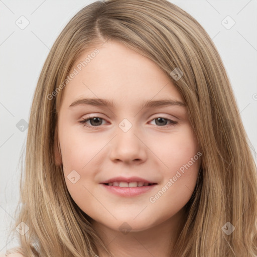 Joyful white child female with long  brown hair and brown eyes