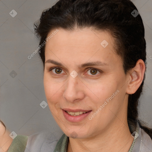 Joyful white adult female with short  brown hair and brown eyes