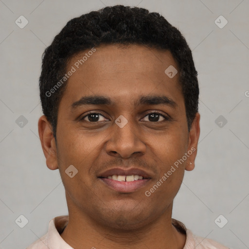 Joyful latino young-adult male with short  black hair and brown eyes