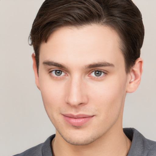 Neutral white young-adult male with short  brown hair and brown eyes