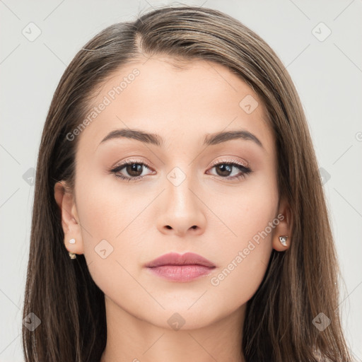 Neutral white young-adult female with long  brown hair and brown eyes