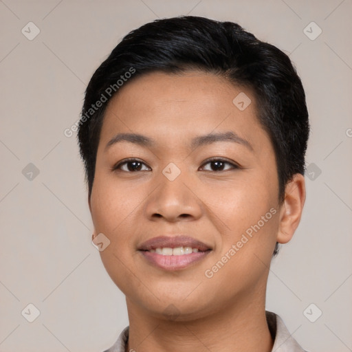 Joyful latino young-adult female with short  black hair and brown eyes