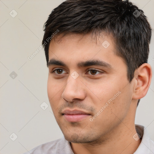 Neutral white young-adult male with short  black hair and brown eyes