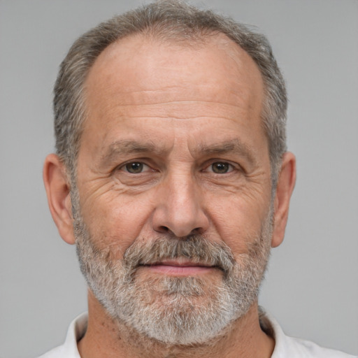 Neutral white middle-aged male with short  gray hair and brown eyes