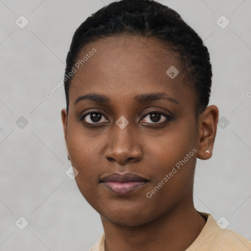 Neutral black young-adult female with short  brown hair and brown eyes