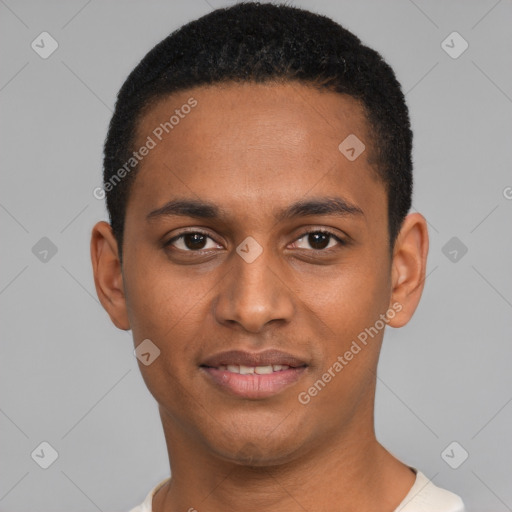 Joyful black young-adult male with short  brown hair and brown eyes