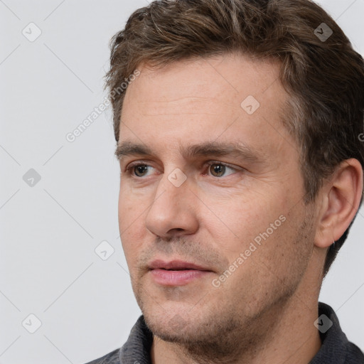 Neutral white adult male with short  brown hair and brown eyes