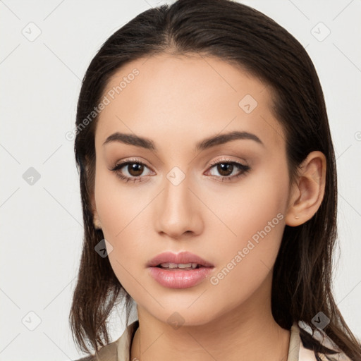 Neutral white young-adult female with long  brown hair and brown eyes