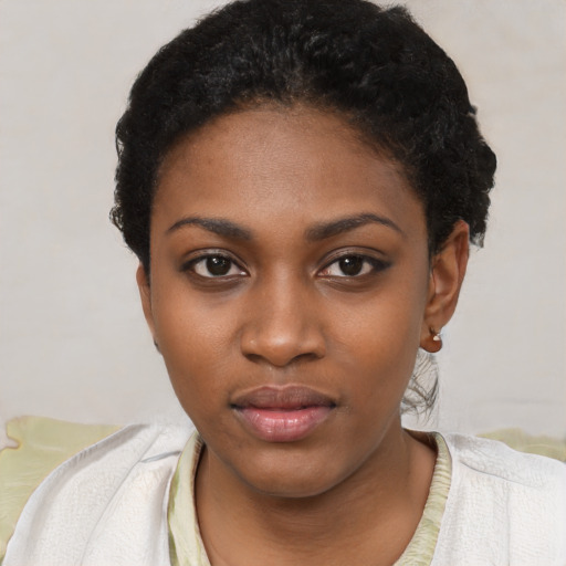 Neutral black young-adult female with short  black hair and brown eyes