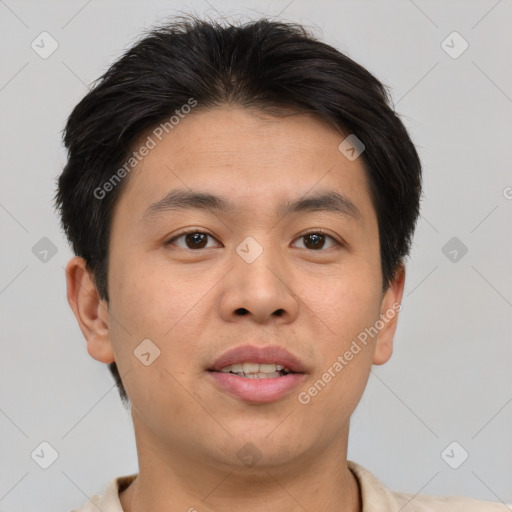 Joyful asian young-adult male with short  brown hair and brown eyes