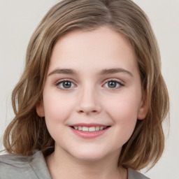 Joyful white child female with medium  brown hair and grey eyes