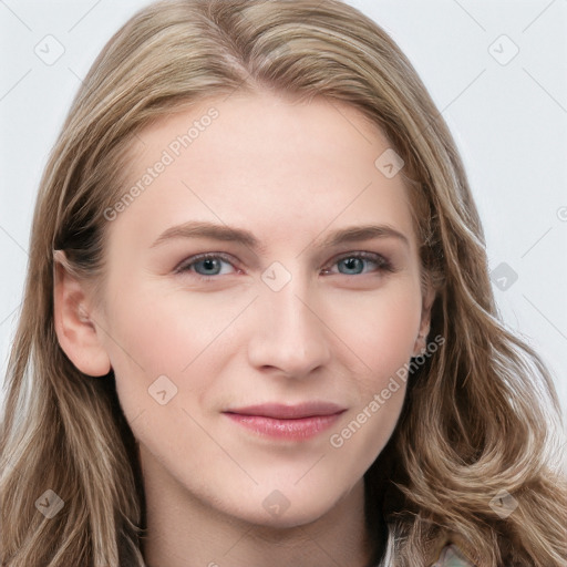 Joyful white young-adult female with long  brown hair and blue eyes