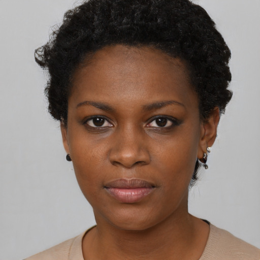 Neutral black young-adult female with short  black hair and brown eyes