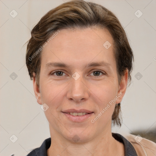 Joyful white adult female with short  brown hair and brown eyes