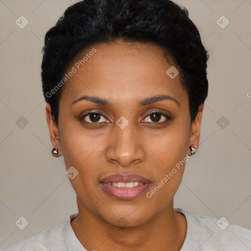 Joyful black young-adult female with short  black hair and brown eyes