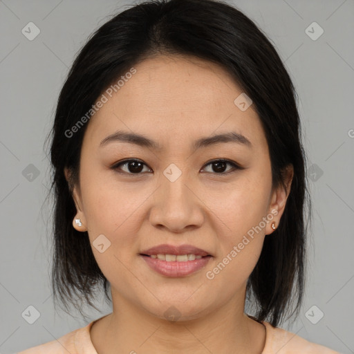 Joyful asian young-adult female with medium  brown hair and brown eyes