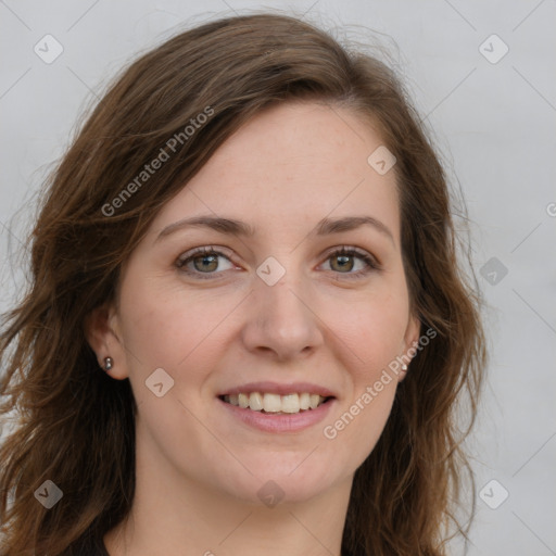 Joyful white young-adult female with long  brown hair and green eyes