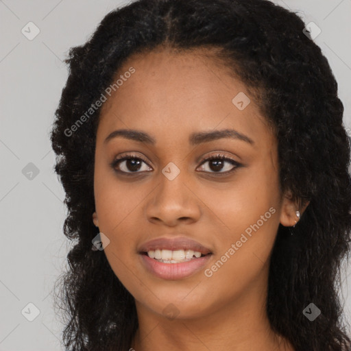 Joyful latino young-adult female with long  black hair and brown eyes