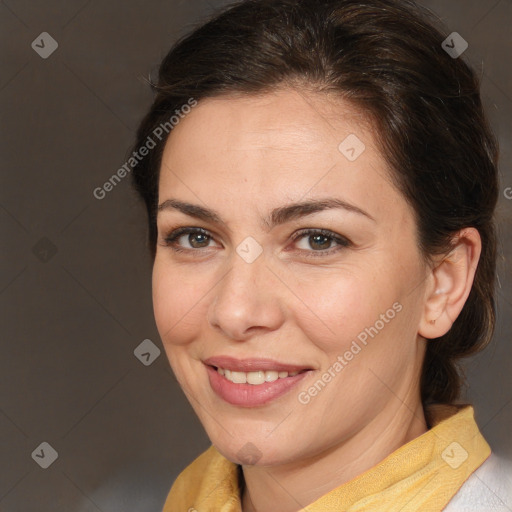 Joyful white adult female with medium  brown hair and brown eyes