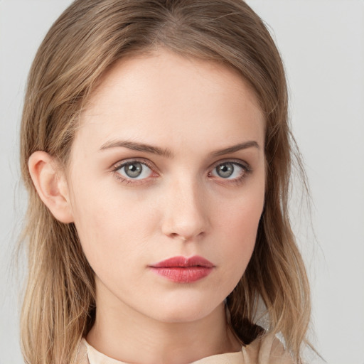 Neutral white young-adult female with medium  brown hair and blue eyes