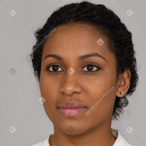 Neutral black young-adult female with medium  brown hair and brown eyes