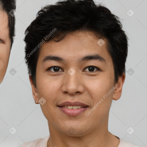 Joyful asian young-adult male with short  brown hair and brown eyes