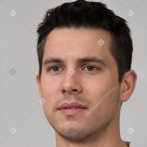 Neutral white young-adult male with short  brown hair and brown eyes