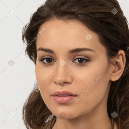 Neutral white young-adult female with long  brown hair and brown eyes