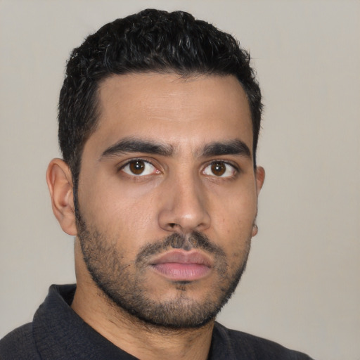 Neutral latino young-adult male with short  black hair and brown eyes