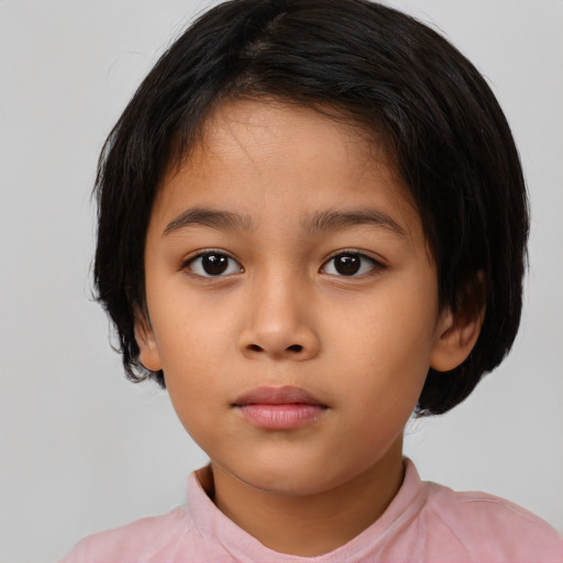 Neutral latino child female with medium  brown hair and brown eyes