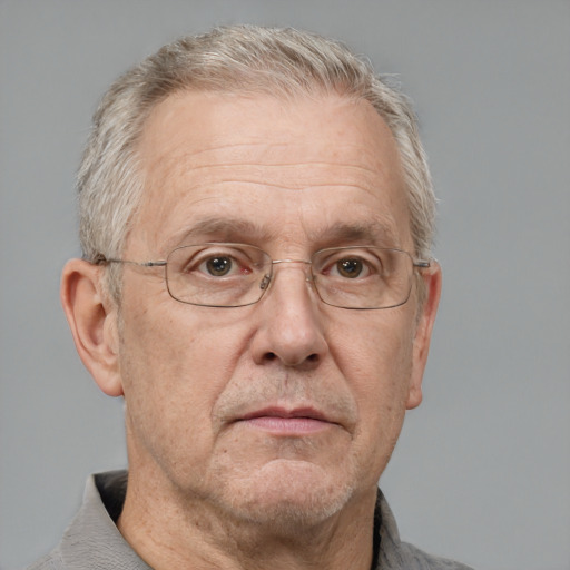 Neutral white middle-aged male with short  gray hair and grey eyes