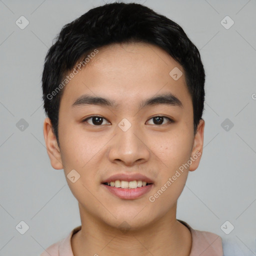 Joyful asian young-adult male with short  black hair and brown eyes