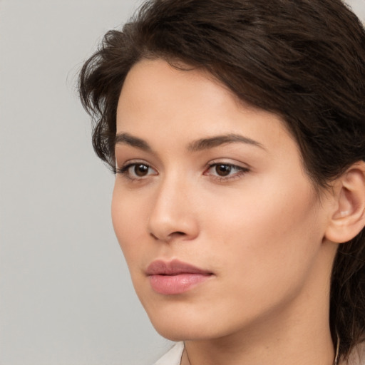 Neutral white young-adult female with medium  brown hair and brown eyes