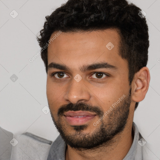 Neutral white young-adult male with short  black hair and brown eyes