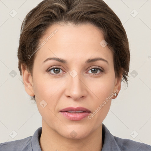 Joyful white adult female with short  brown hair and brown eyes