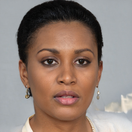 Neutral black young-adult female with short  brown hair and brown eyes