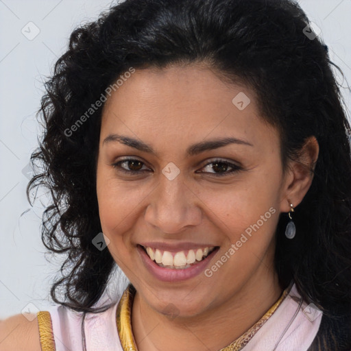 Joyful latino young-adult female with long  brown hair and brown eyes