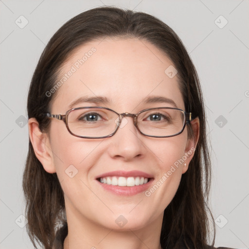 Joyful white young-adult female with long  brown hair and grey eyes