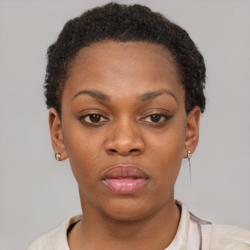 Neutral black young-adult female with short  brown hair and brown eyes