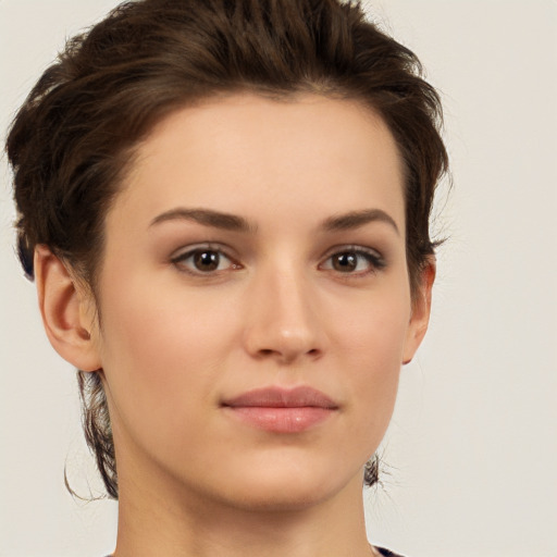 Neutral white young-adult female with short  brown hair and brown eyes