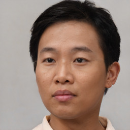 Neutral asian young-adult male with short  brown hair and brown eyes