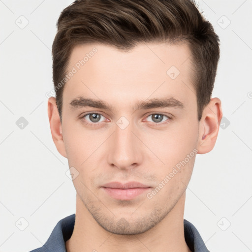 Neutral white young-adult male with short  brown hair and brown eyes