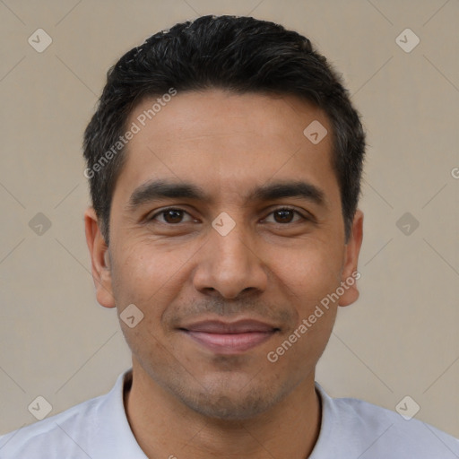 Joyful latino young-adult male with short  black hair and brown eyes