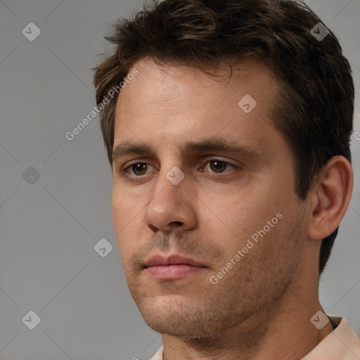 Neutral white young-adult male with short  brown hair and brown eyes