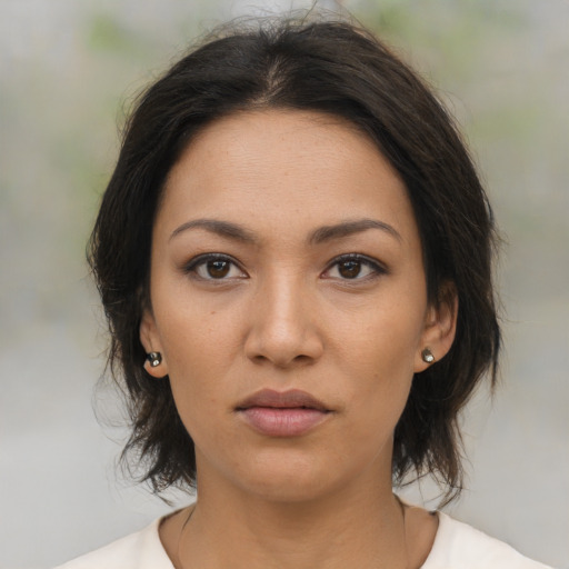 Neutral asian young-adult female with medium  brown hair and brown eyes
