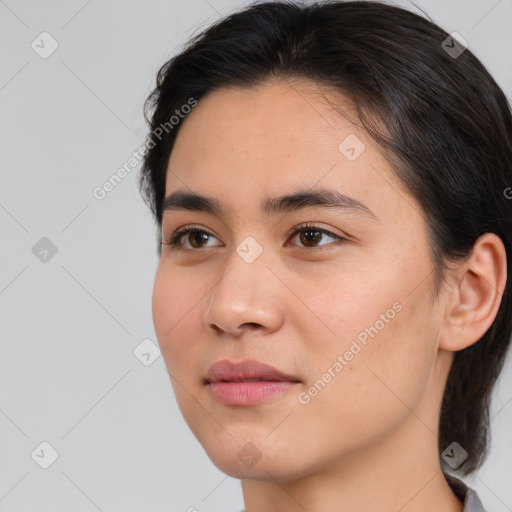 Neutral white young-adult female with medium  brown hair and brown eyes