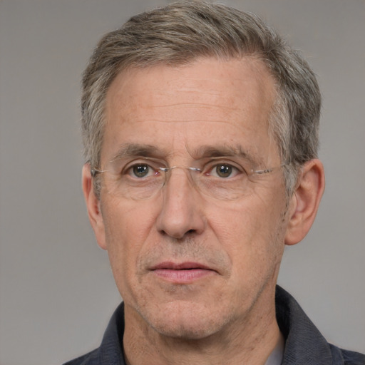 Neutral white middle-aged male with short  gray hair and brown eyes