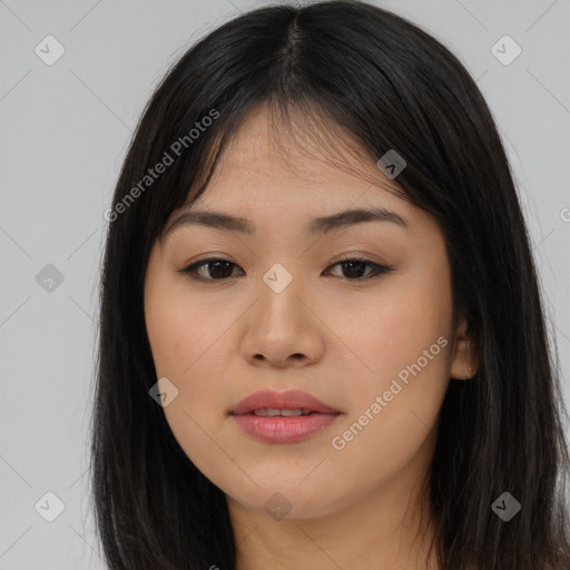 Joyful asian young-adult female with long  black hair and brown eyes